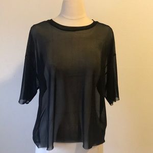 Completely see-through fishnet top